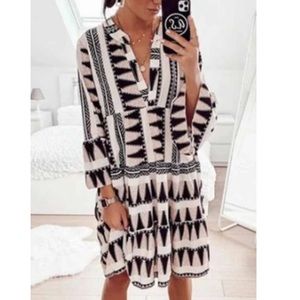 Geometric patterned black and pale pink dress. Sz med
